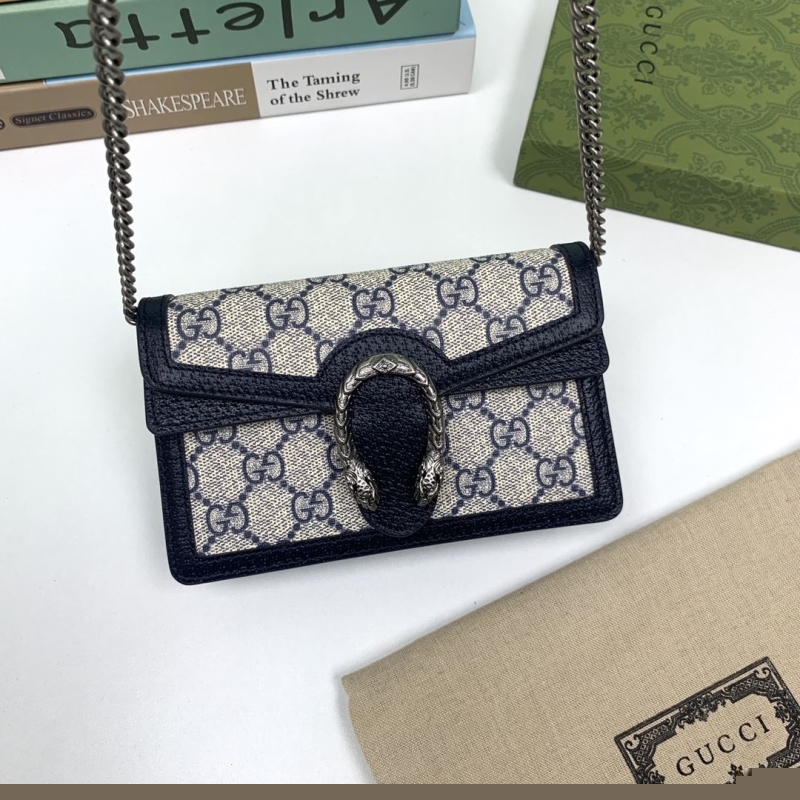G*u*i satchel bags